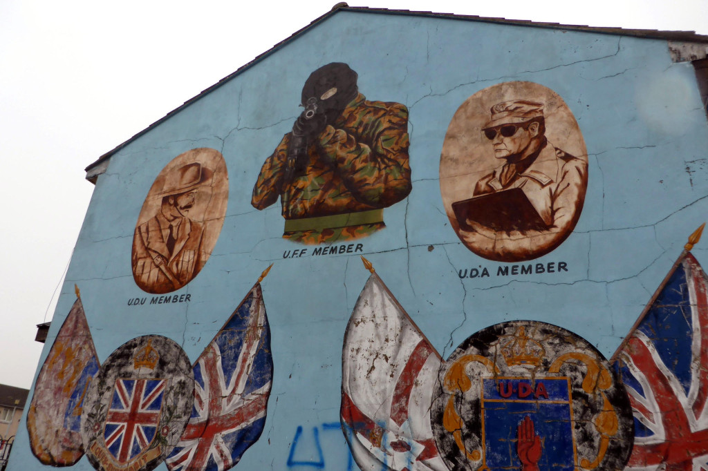A menacing mural adorns the side of a house in Belfast, Northern Ireland