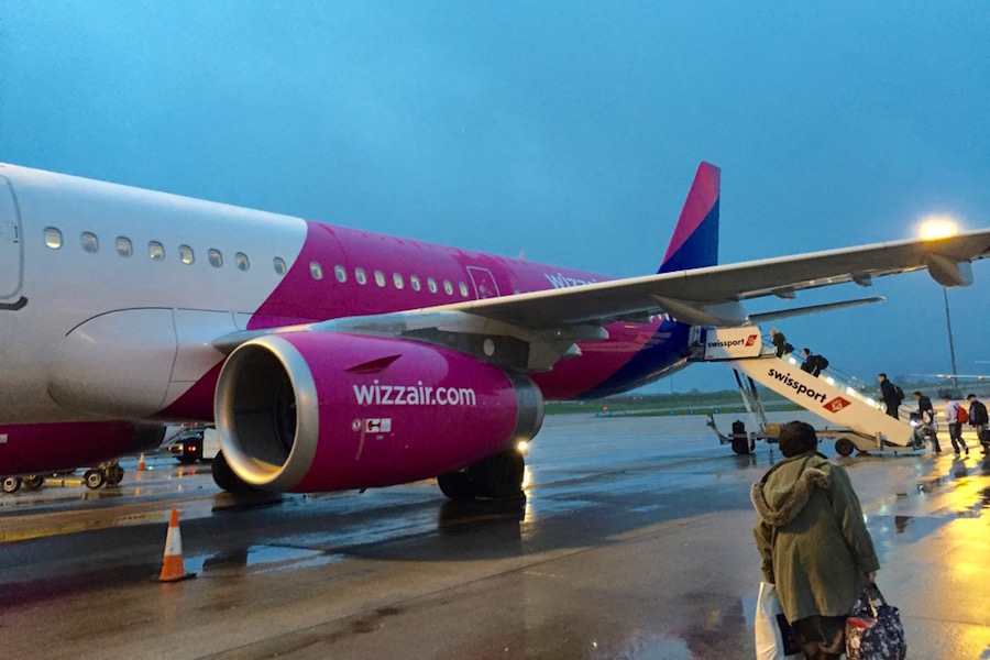 A Wizz Air flight boards at Luton Airport