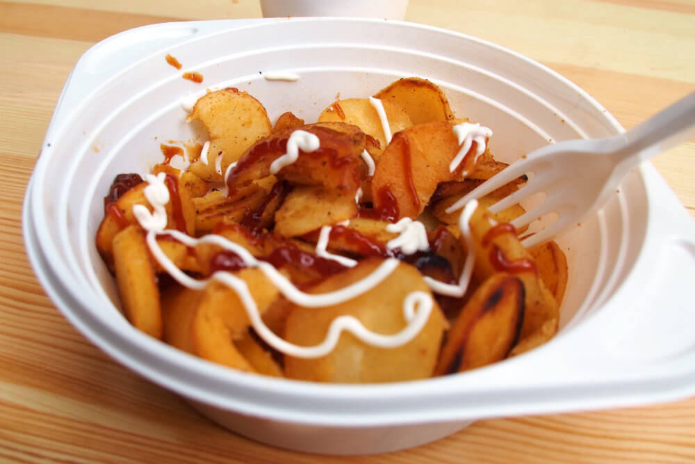 Fried Potatoes with spicy tomato sauce and mayonnaise