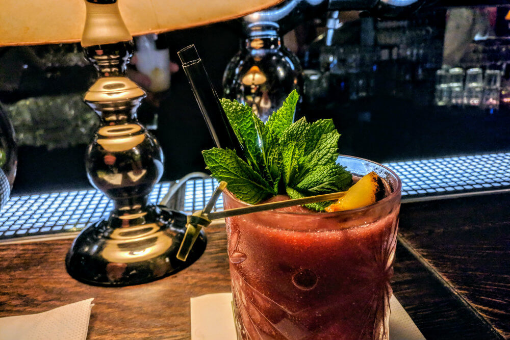 A gorgeous and sumptuous blackberry cocktail enjoyed at the the Bar That Does Not Exist in Brno, Czech Republic