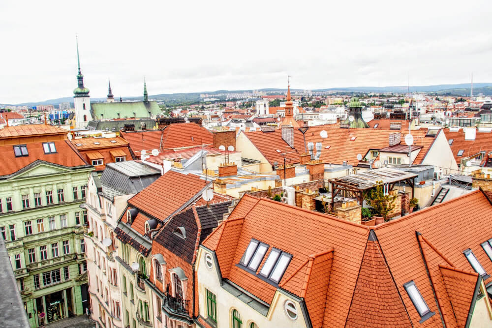 Red rood tiles and church steeples in Brno, Czechia, indicative of so many European cities