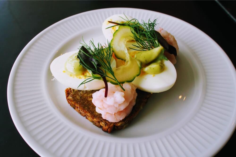 Classic prawn and egg Smørrebrød is a must have