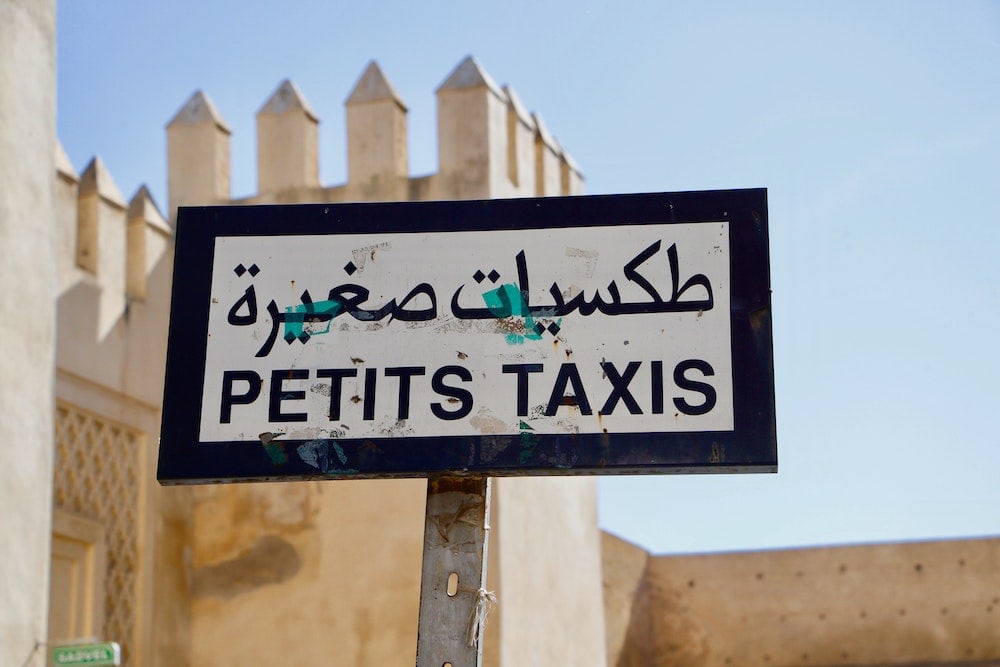 Petit Taxi ranks are marked by signs like this one