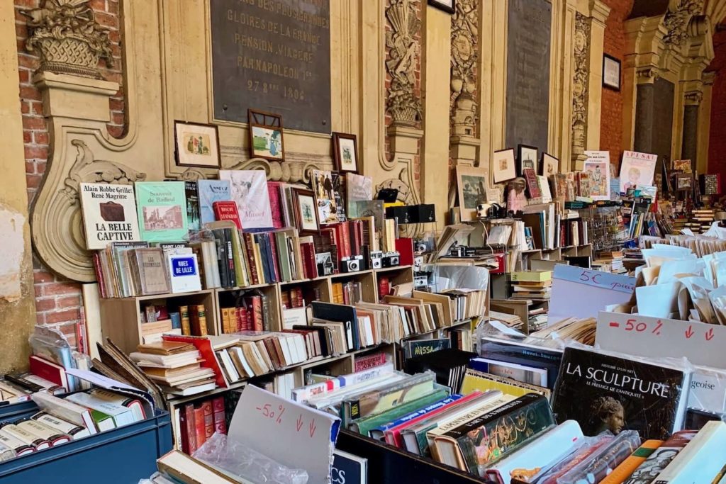 Book stalls are a permanent feature inside The inner courtyard of La Vieille Bourse. Make sure you have a rummage
