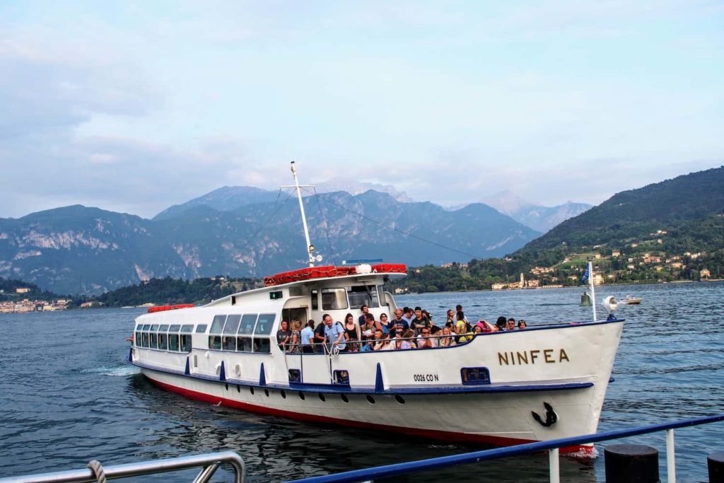 A ferry arrives in Argegno on Lake Como, Italy