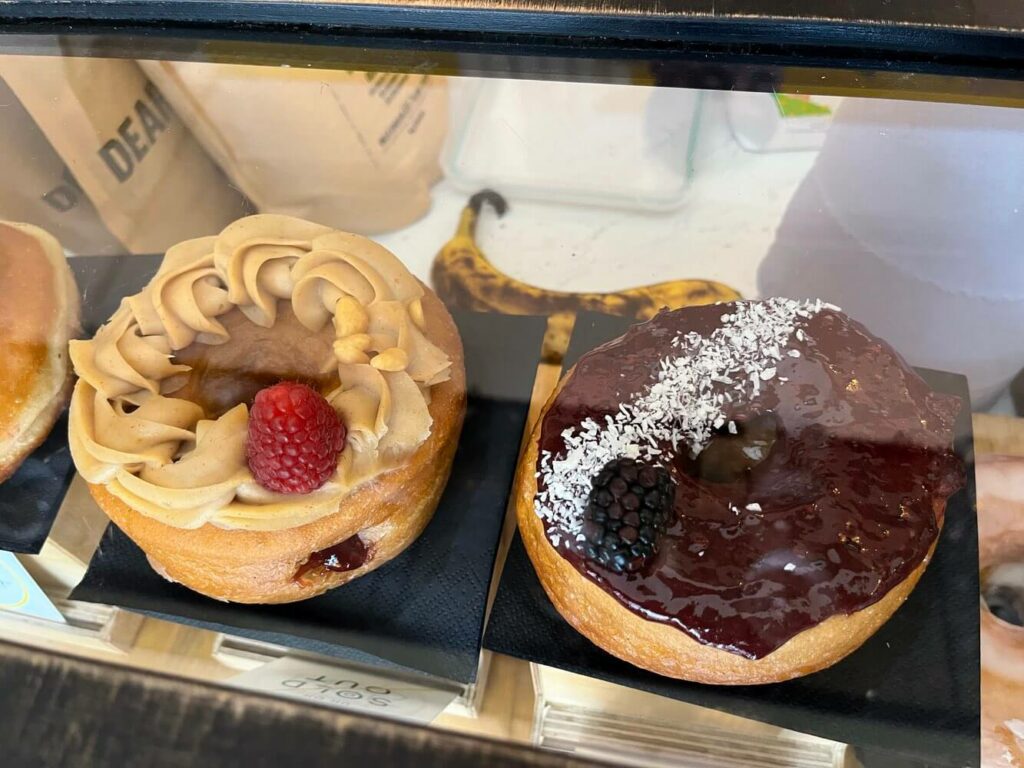 Just two of a selection of fantastically indulgent vegan doughnuts at Perk cafe, Inverness