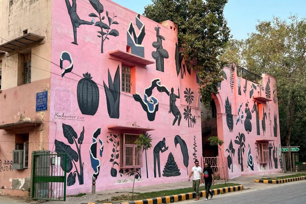 A shockingly pink mural in Lodhi Art District, Delhu